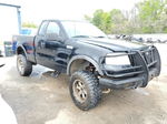 2004 Ford F150  Black vin: 1FTRF14524NC24414