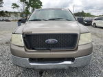 2004 Ford F150  Gold vin: 1FTRX12W44NA09495