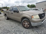 2004 Ford F150  Gold vin: 1FTRX12W44NA09495