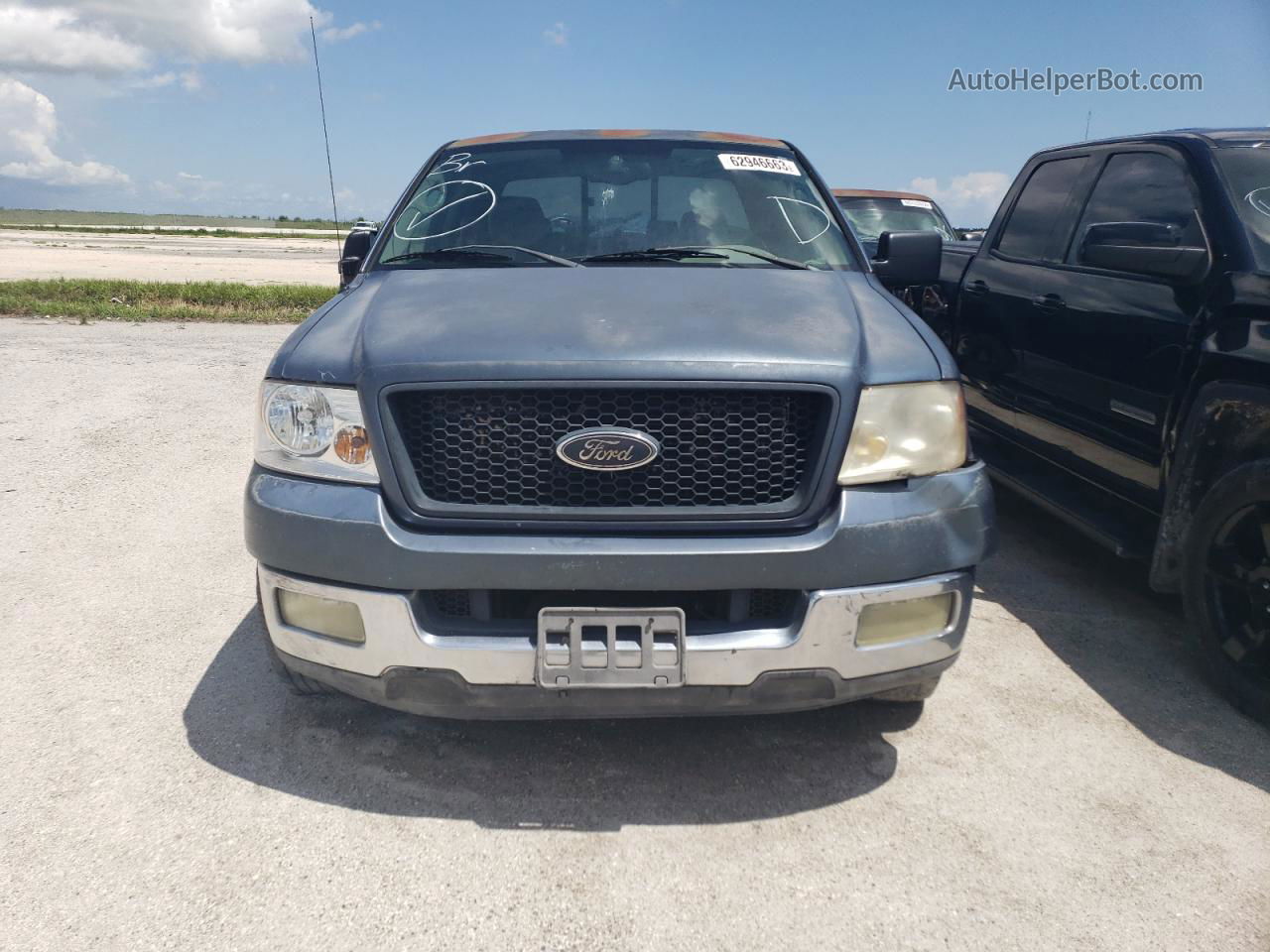 2004 Ford F150  Blue vin: 1FTRX12W44NB15543