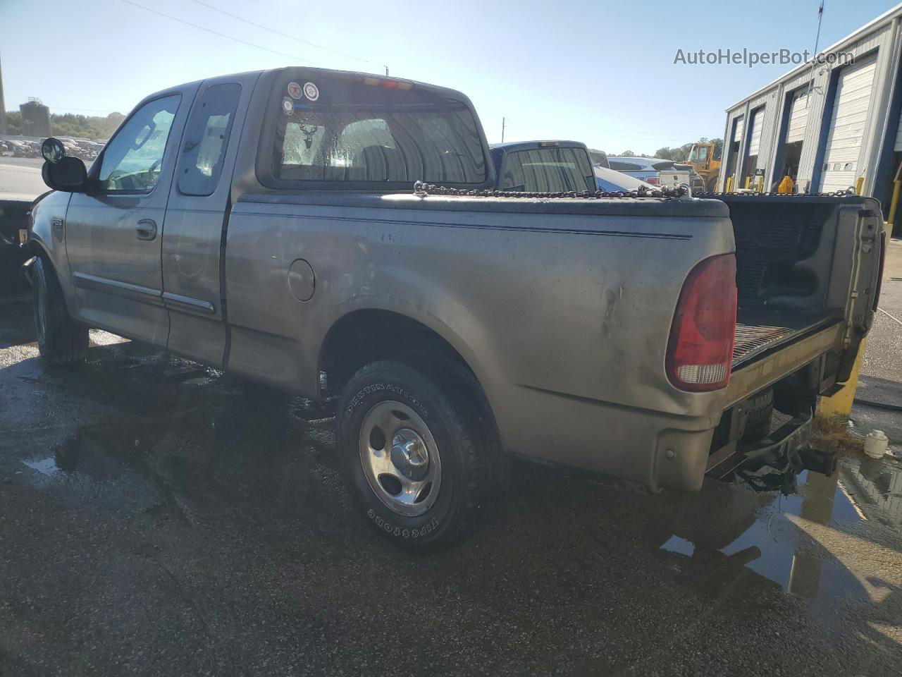 2003 Ford F150  Желто-коричневый vin: 1FTRX17293NA95438