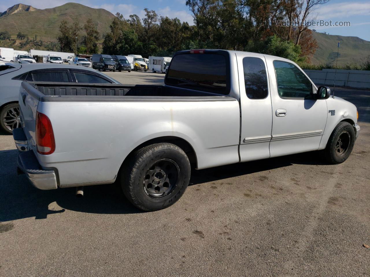 2001 Ford F150  Серебряный vin: 1FTRX17W91NA13417