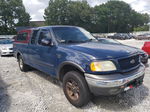 2003 Ford F150  Blue vin: 1FTRX18W33NA73436