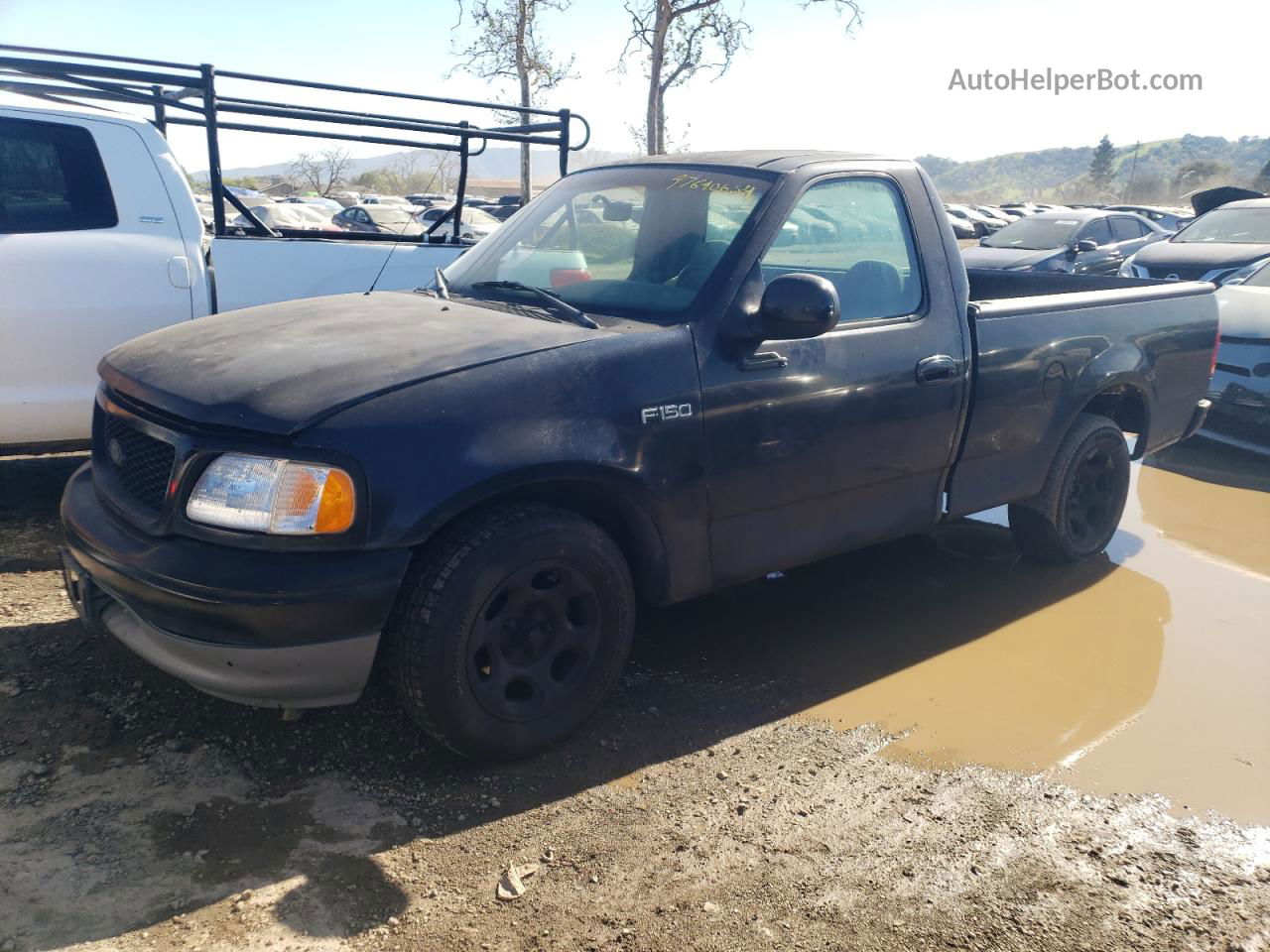 2001 Ford F150  Black vin: 1FTZF17231NB18910