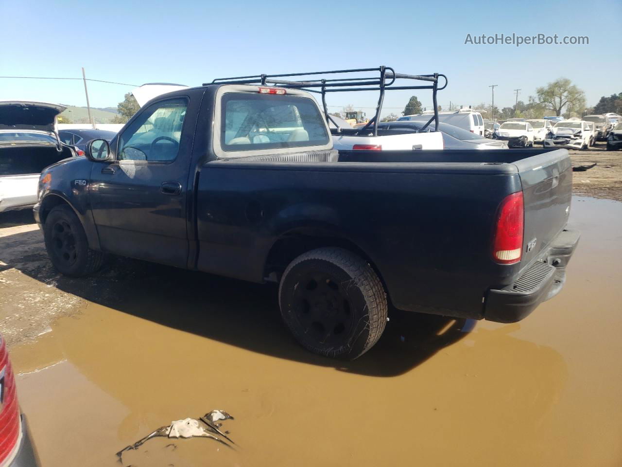 2001 Ford F150  Black vin: 1FTZF17231NB18910