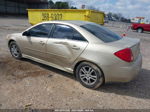 2006 Pontiac G6   Gold vin: 1G2ZG558064109403