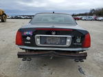 2005 Cadillac Deville  Черный vin: 1G6KD54Y05U190735