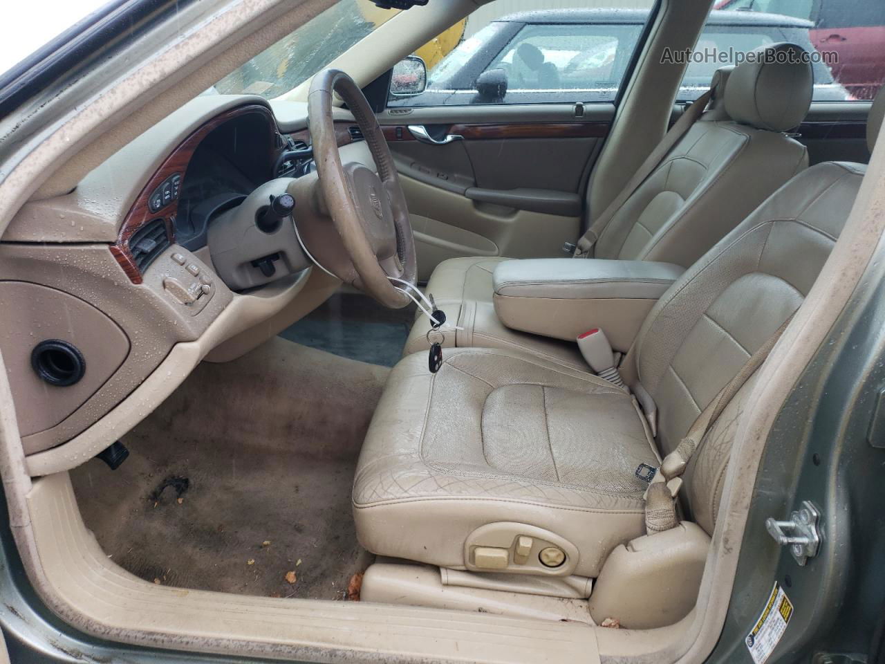 2005 Cadillac Deville  Tan vin: 1G6KD54Y15U165455