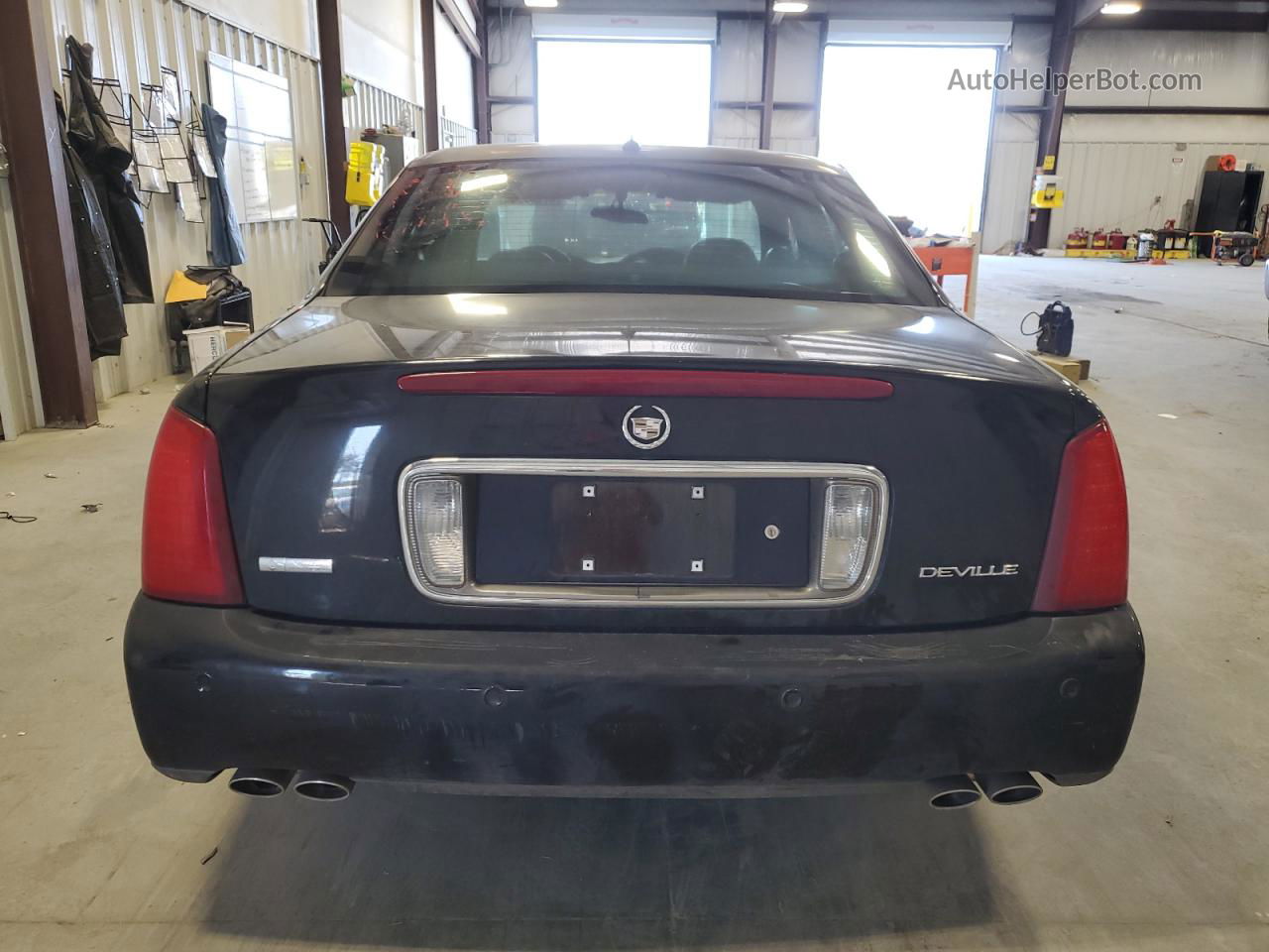 2005 Cadillac Deville  Black vin: 1G6KD54Y25U253026