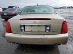 2005 Cadillac Deville  Gold vin: 1G6KD54Y55U149520