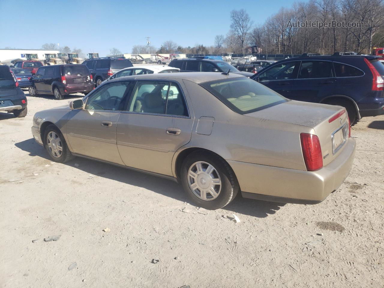 2005 Cadillac Deville  Золотой vin: 1G6KD54Y55U257779