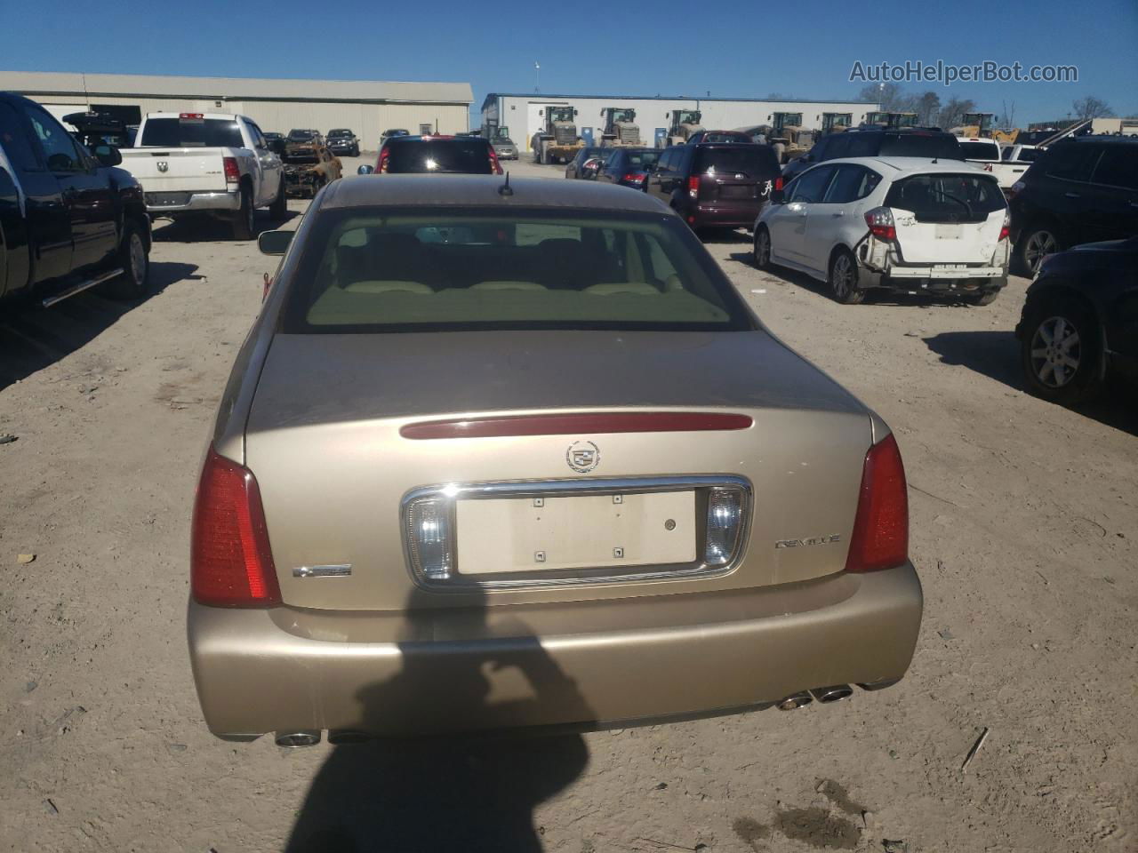 2005 Cadillac Deville  Золотой vin: 1G6KD54Y55U257779