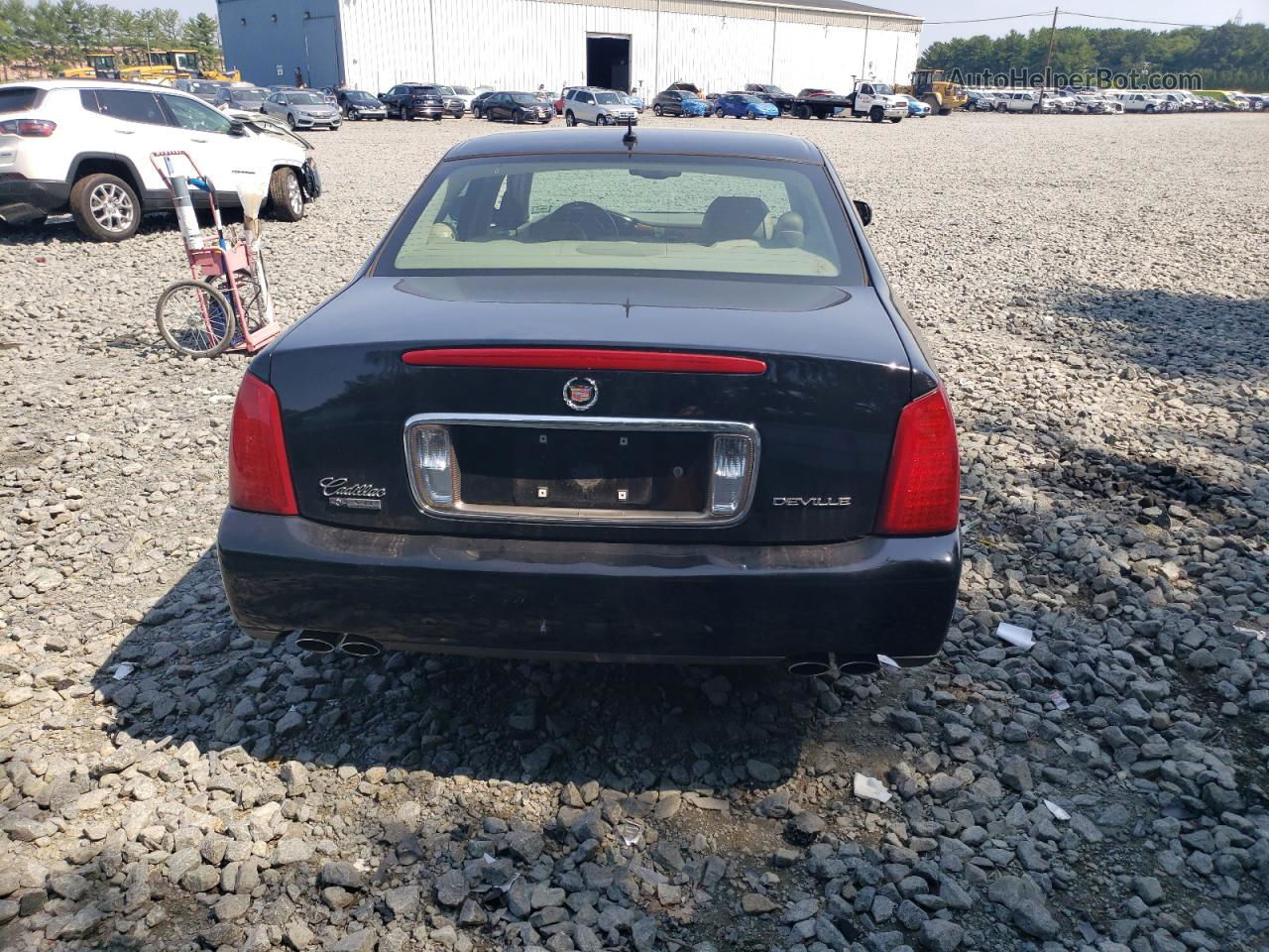 2005 Cadillac Deville  Черный vin: 1G6KD54Y65U231871