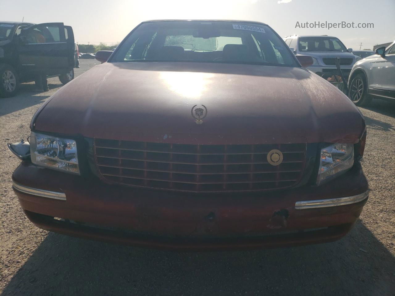 1997 Cadillac Deville  Red vin: 1G6KD54Y9VU255744