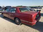 1997 Cadillac Deville  Red vin: 1G6KD54Y9VU255744