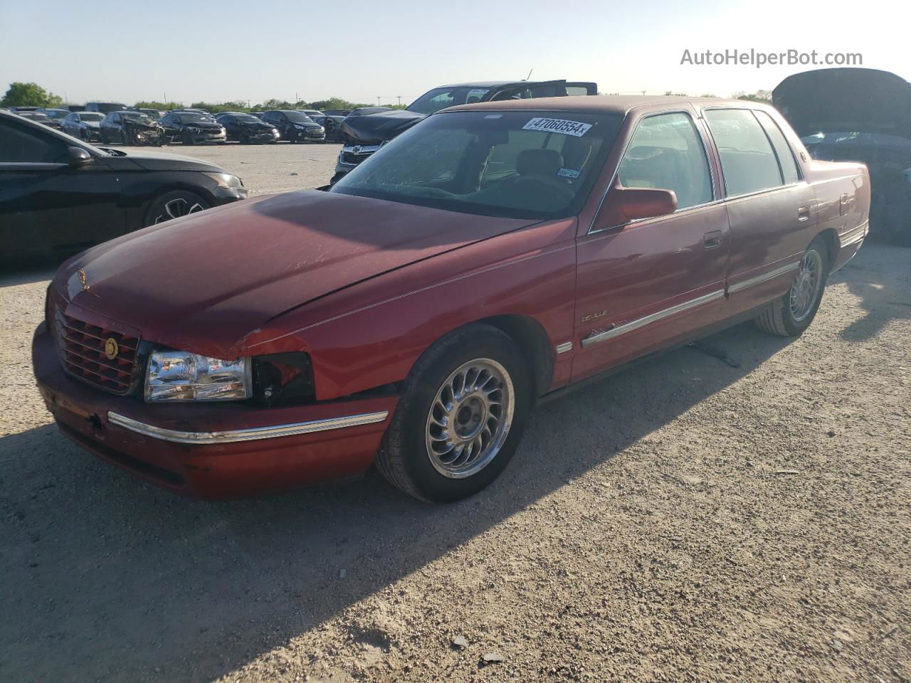 1997 Cadillac Deville  Red vin: 1G6KD54Y9VU255744