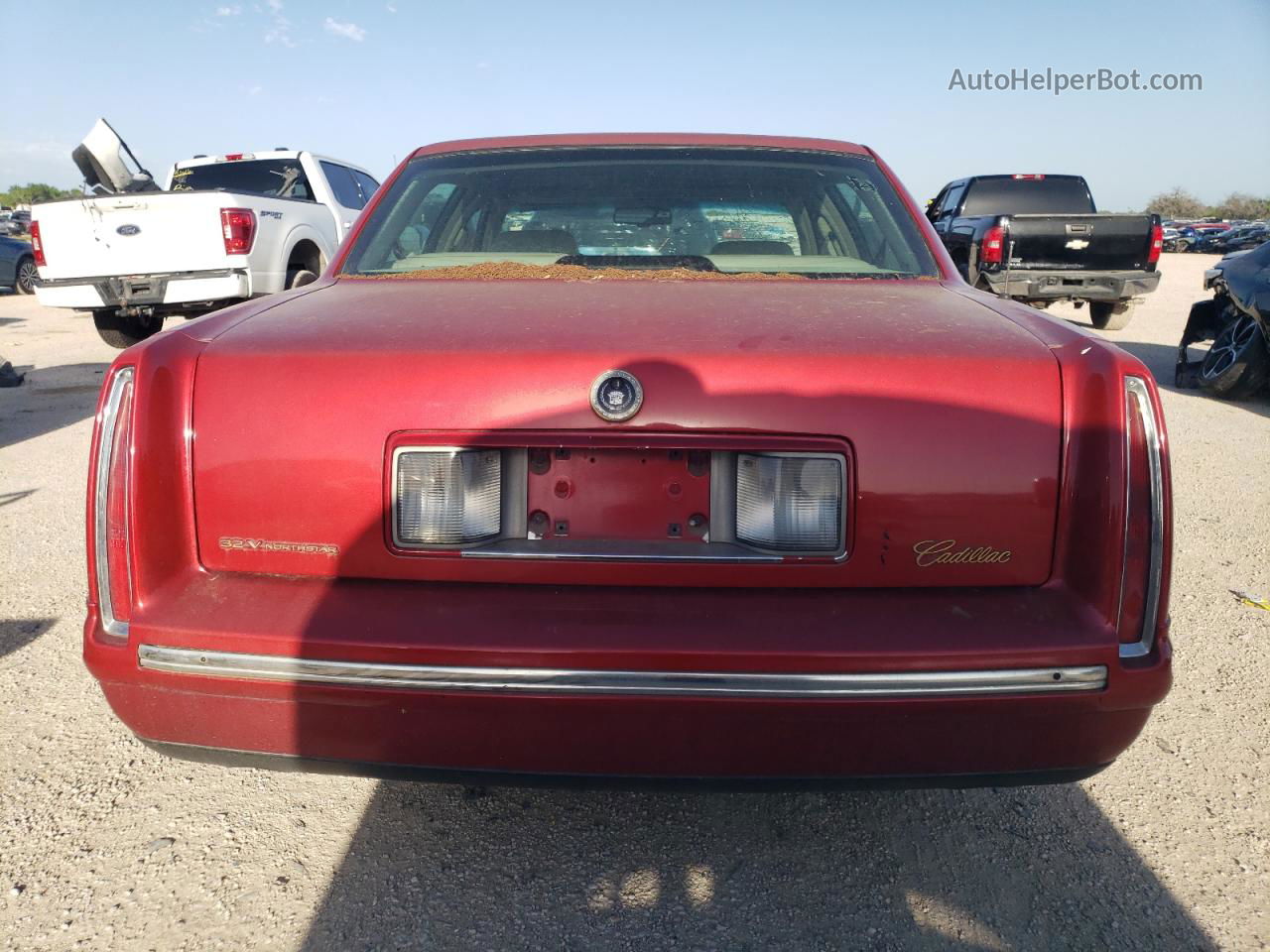 1997 Cadillac Deville  Red vin: 1G6KD54Y9VU255744