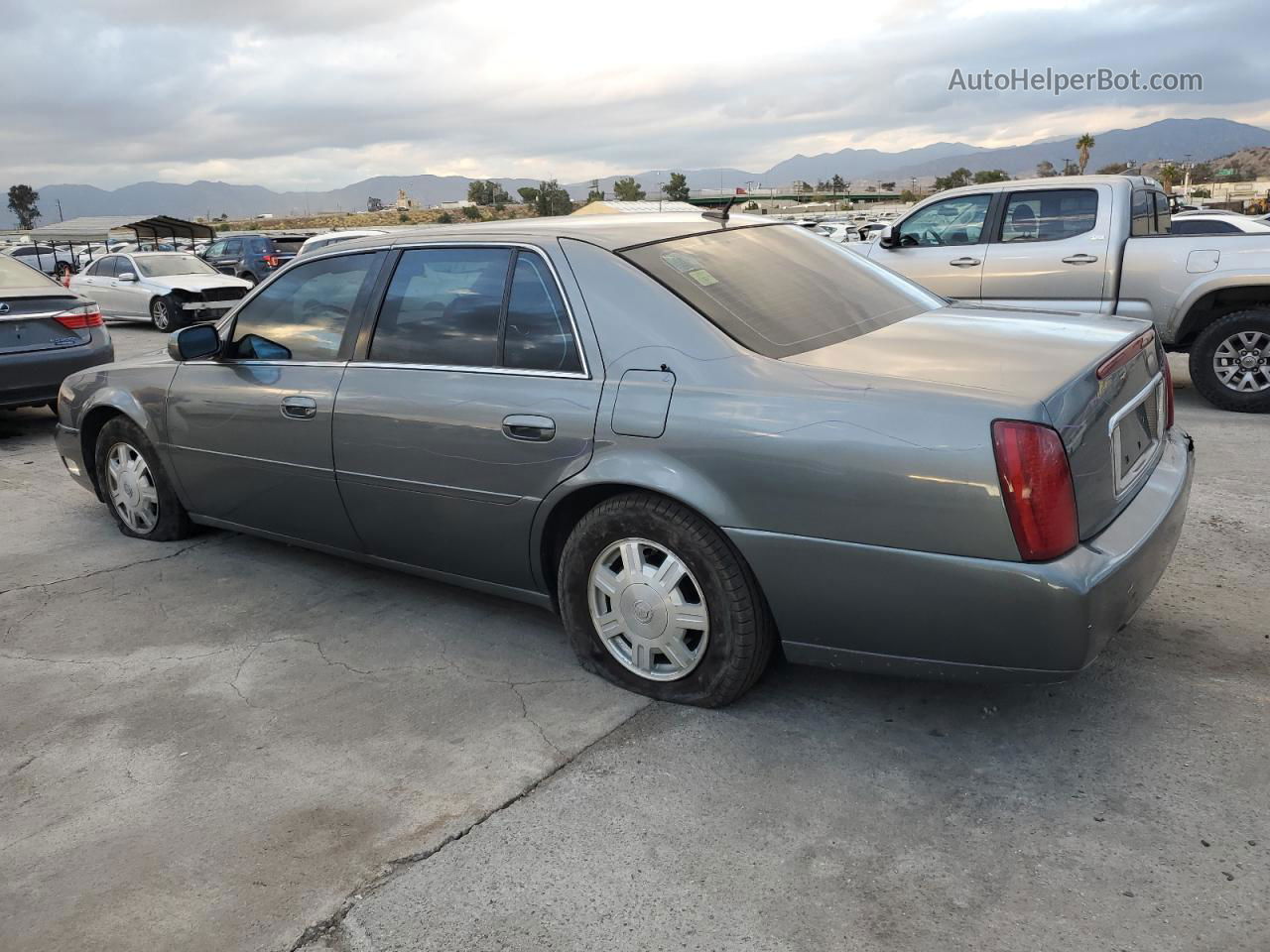 2005 Cadillac Deville  Серый vin: 1G6KD54YX5U259267