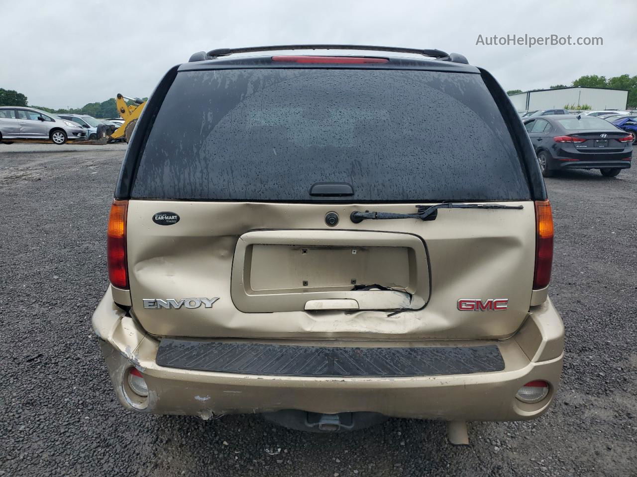 2004 Gmc Envoy  Золотой vin: 1GKDS13S042214435