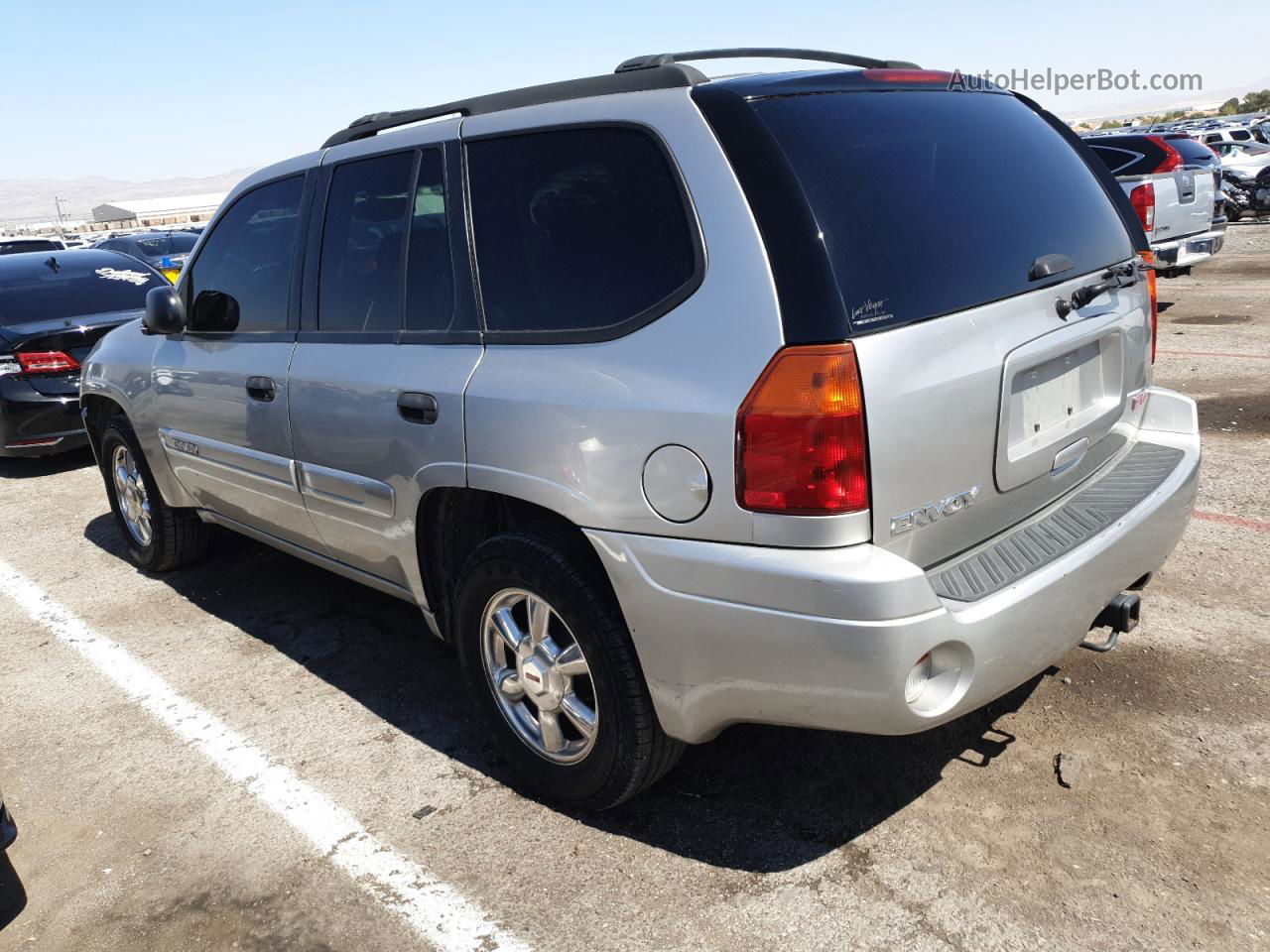 2004 Gmc Envoy  Silver vin: 1GKDS13S042326166