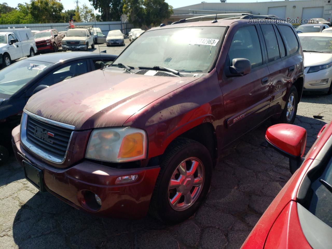 2004 Gmc Envoy  Maroon vin: 1GKDS13S042408513