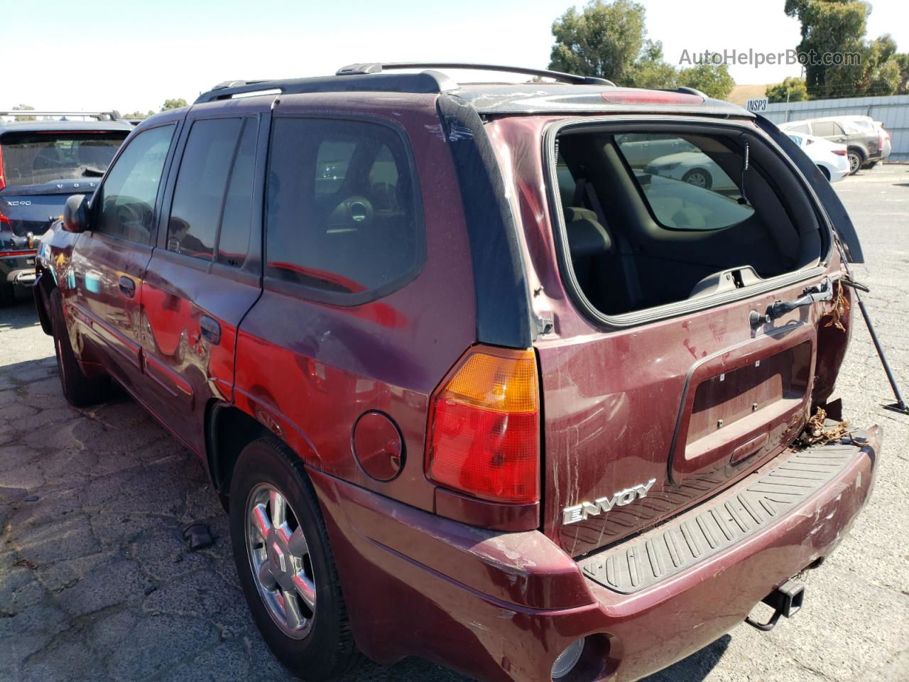 2004 Gmc Envoy  Maroon vin: 1GKDS13S042408513