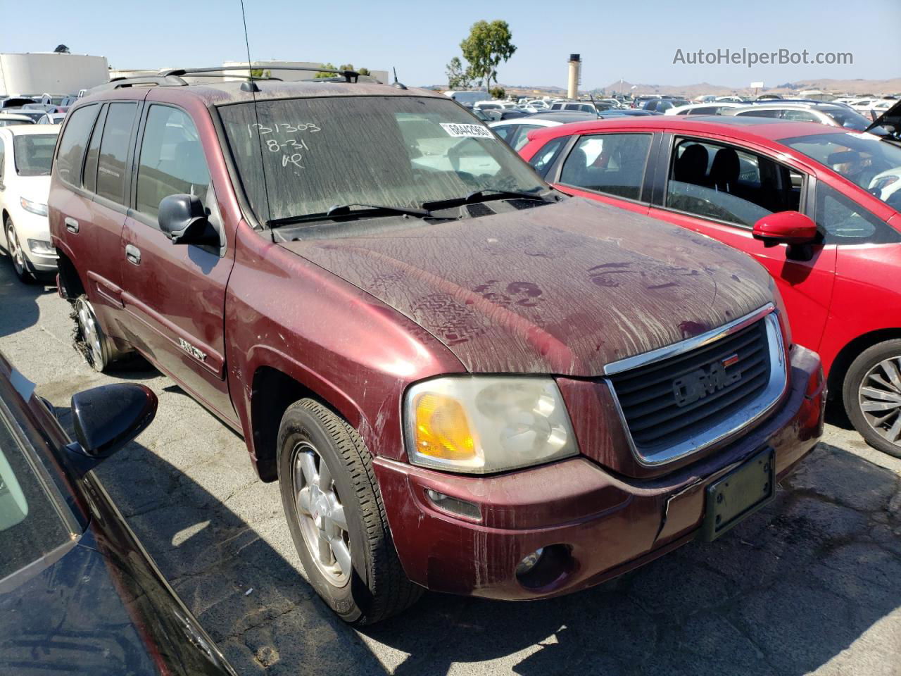 2004 Gmc Envoy  Maroon vin: 1GKDS13S042408513