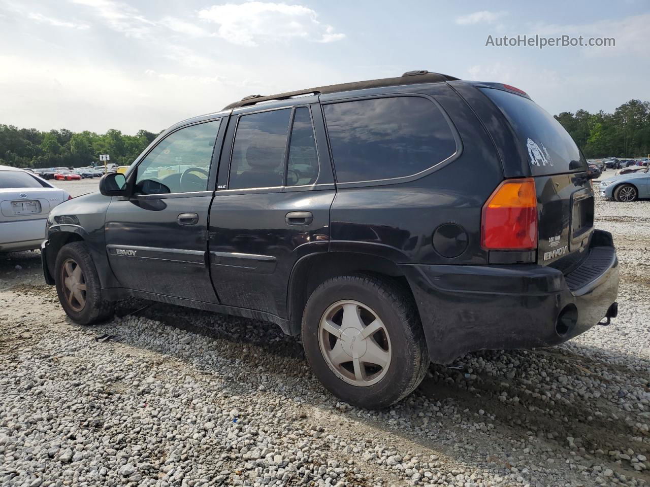 2003 Gmc Envoy  Black vin: 1GKDS13S232258001