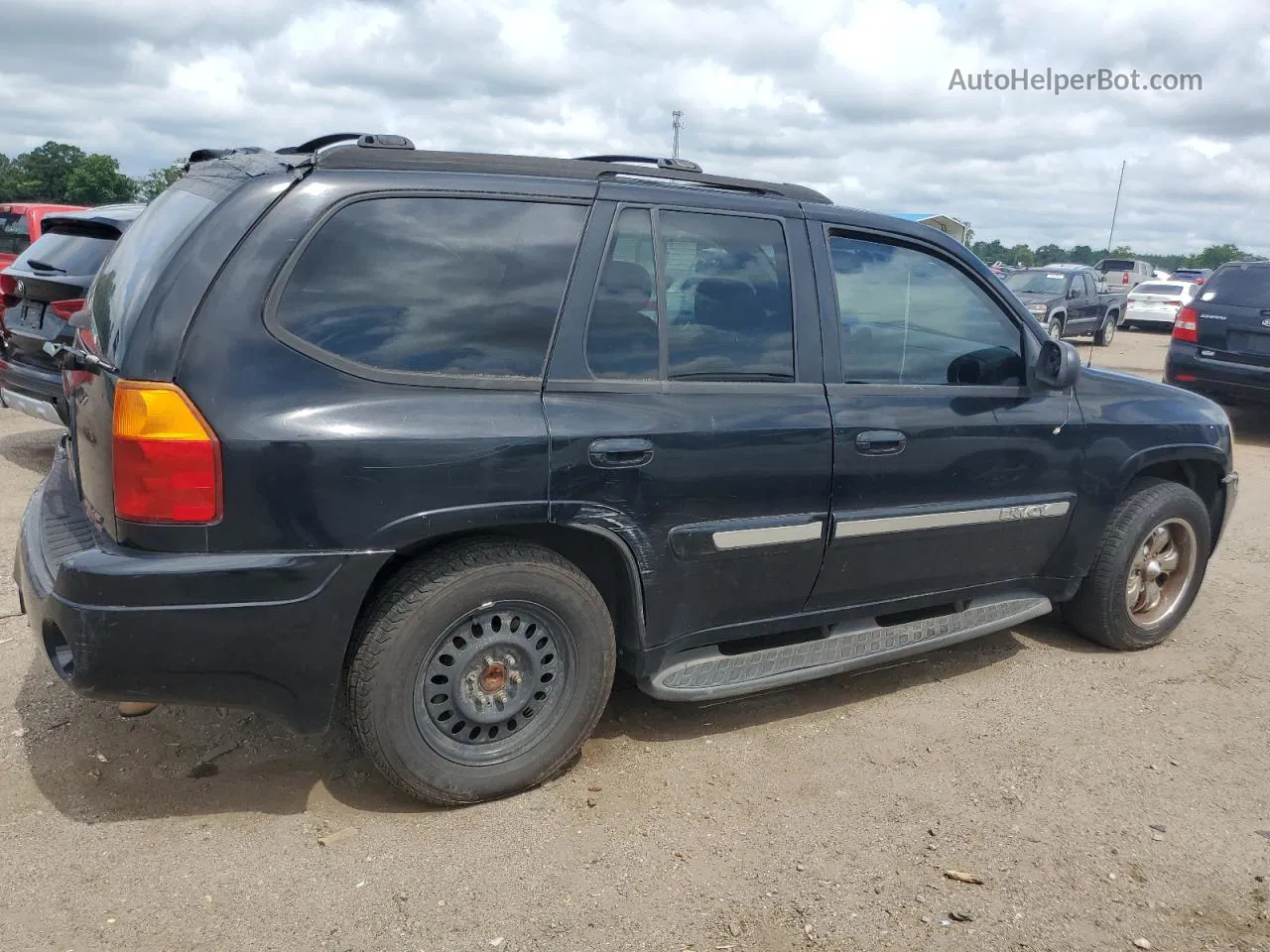 2003 Gmc Envoy  Black vin: 1GKDS13S332131855