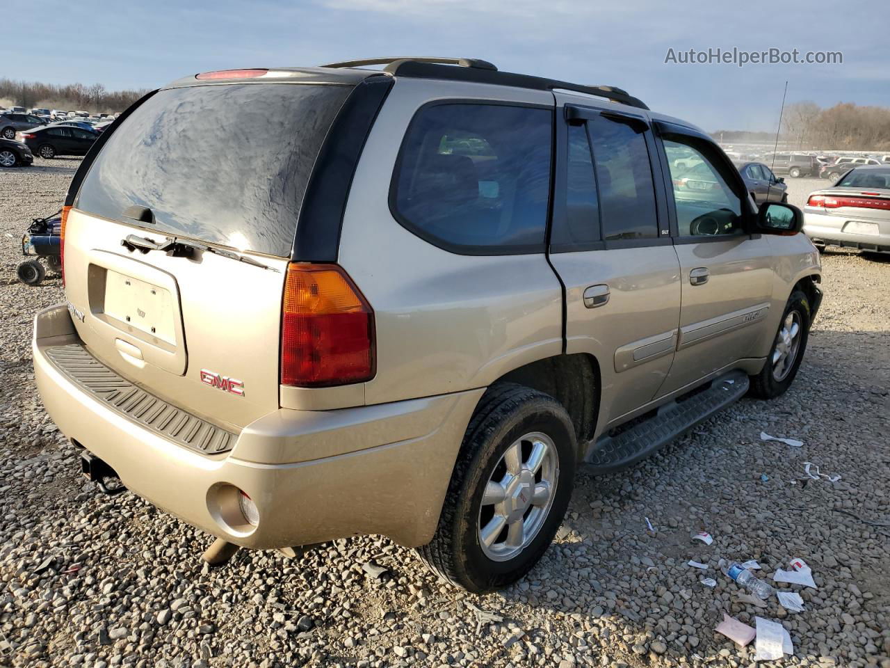 2004 Gmc Envoy  Tan vin: 1GKDS13S342141836