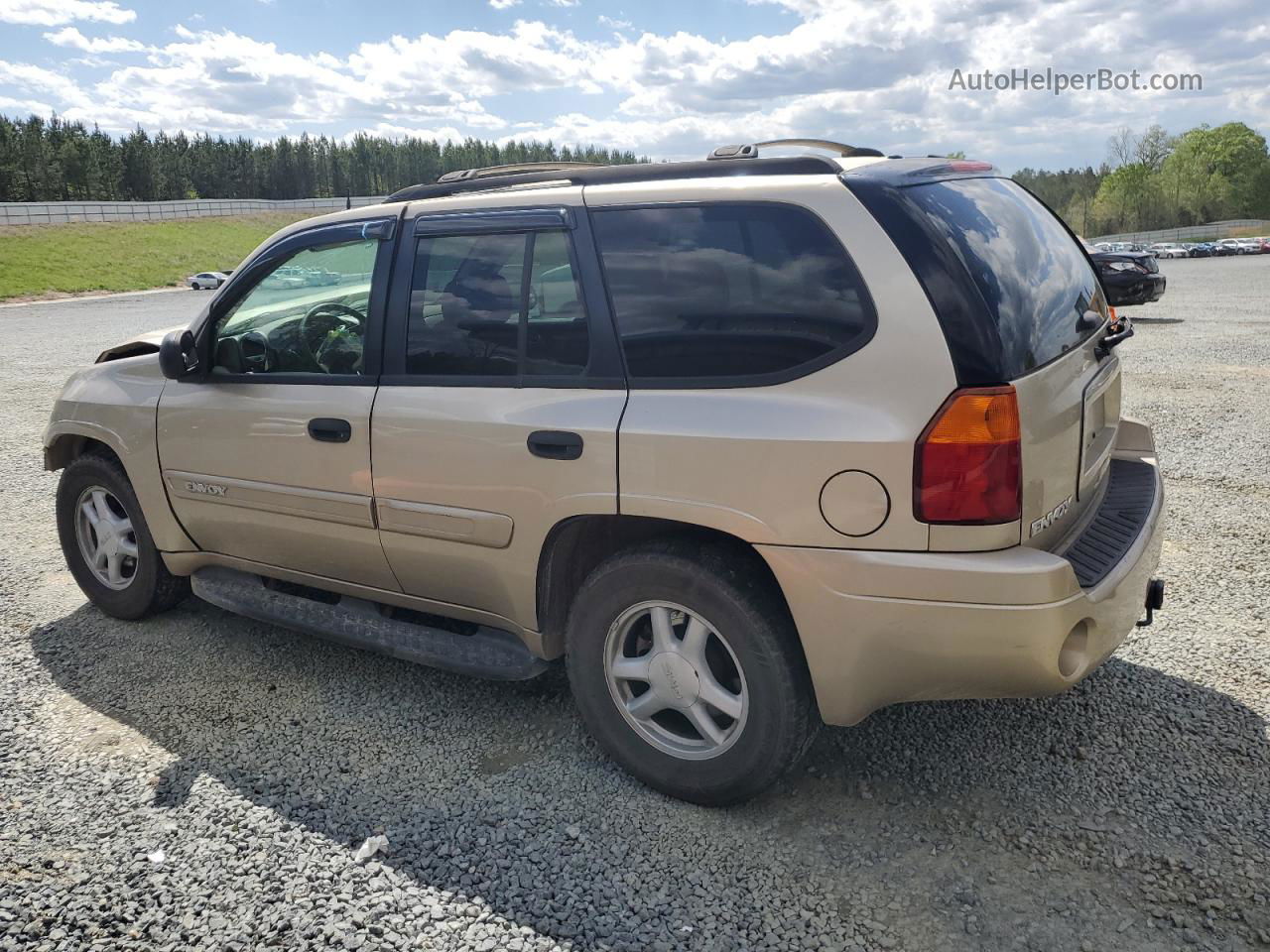 2004 Gmc Envoy  Tan vin: 1GKDS13S442284052