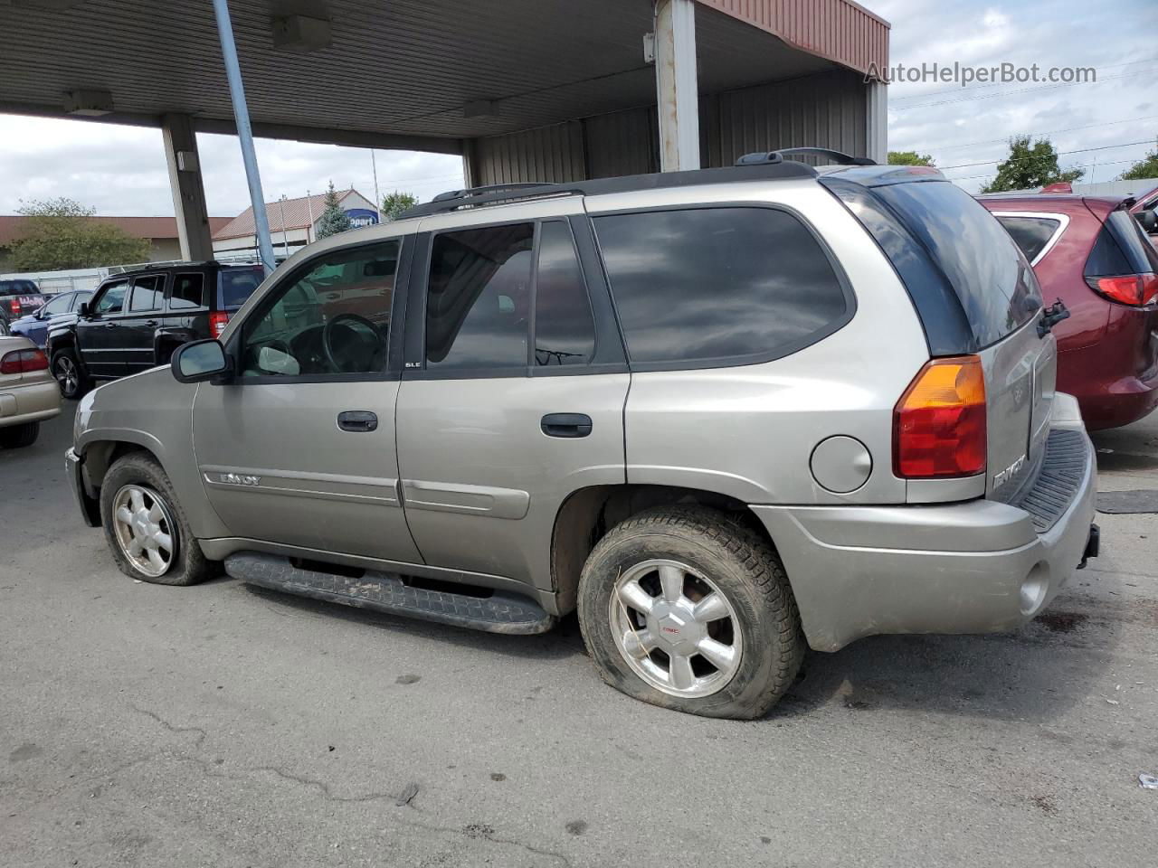 2003 Gmc Envoy  Tan vin: 1GKDS13S532391352