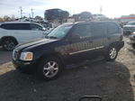 2004 Gmc Envoy  Black vin: 1GKDS13S742128555