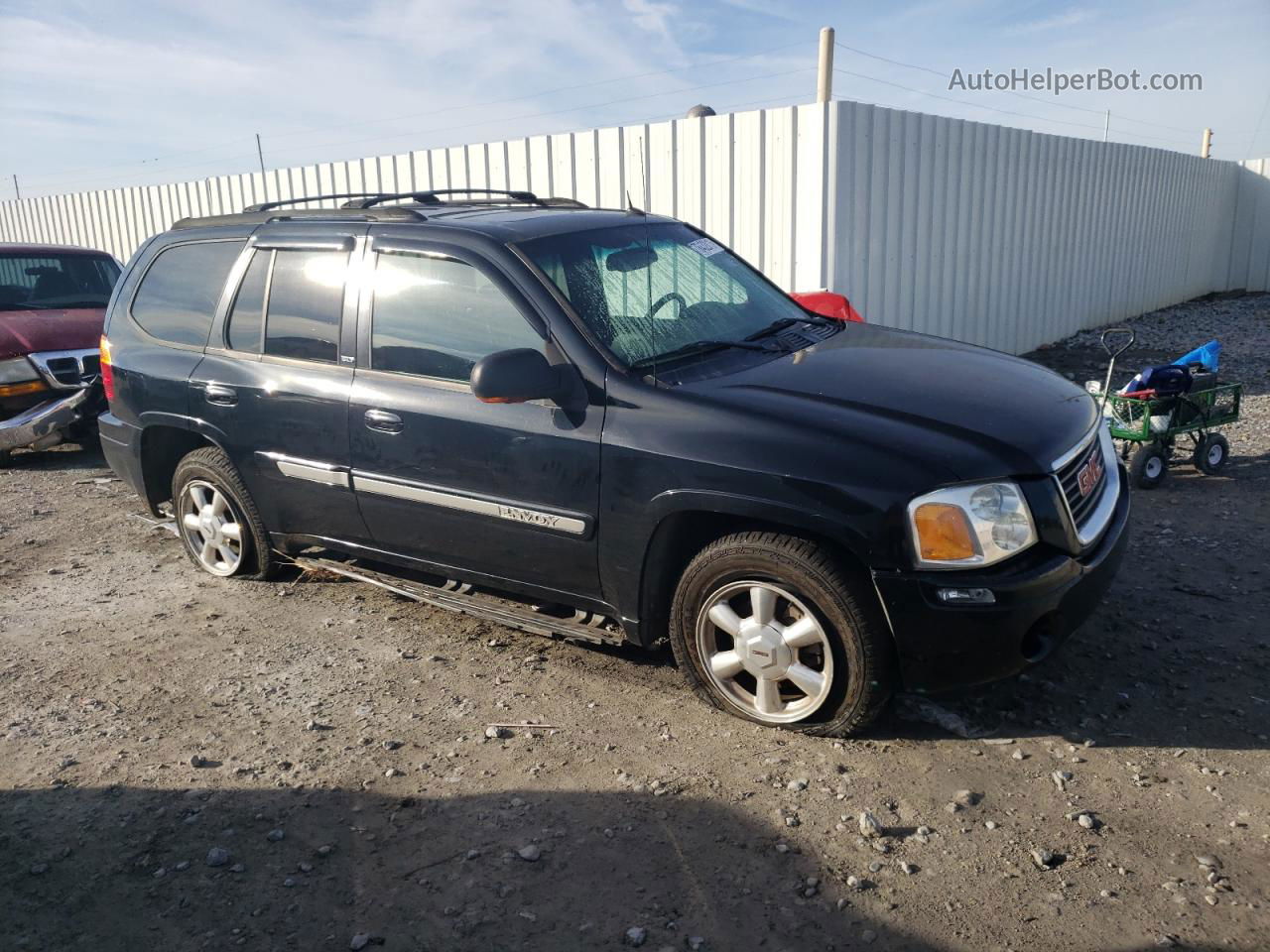 2004 Gmc Envoy  Black vin: 1GKDS13S742128555