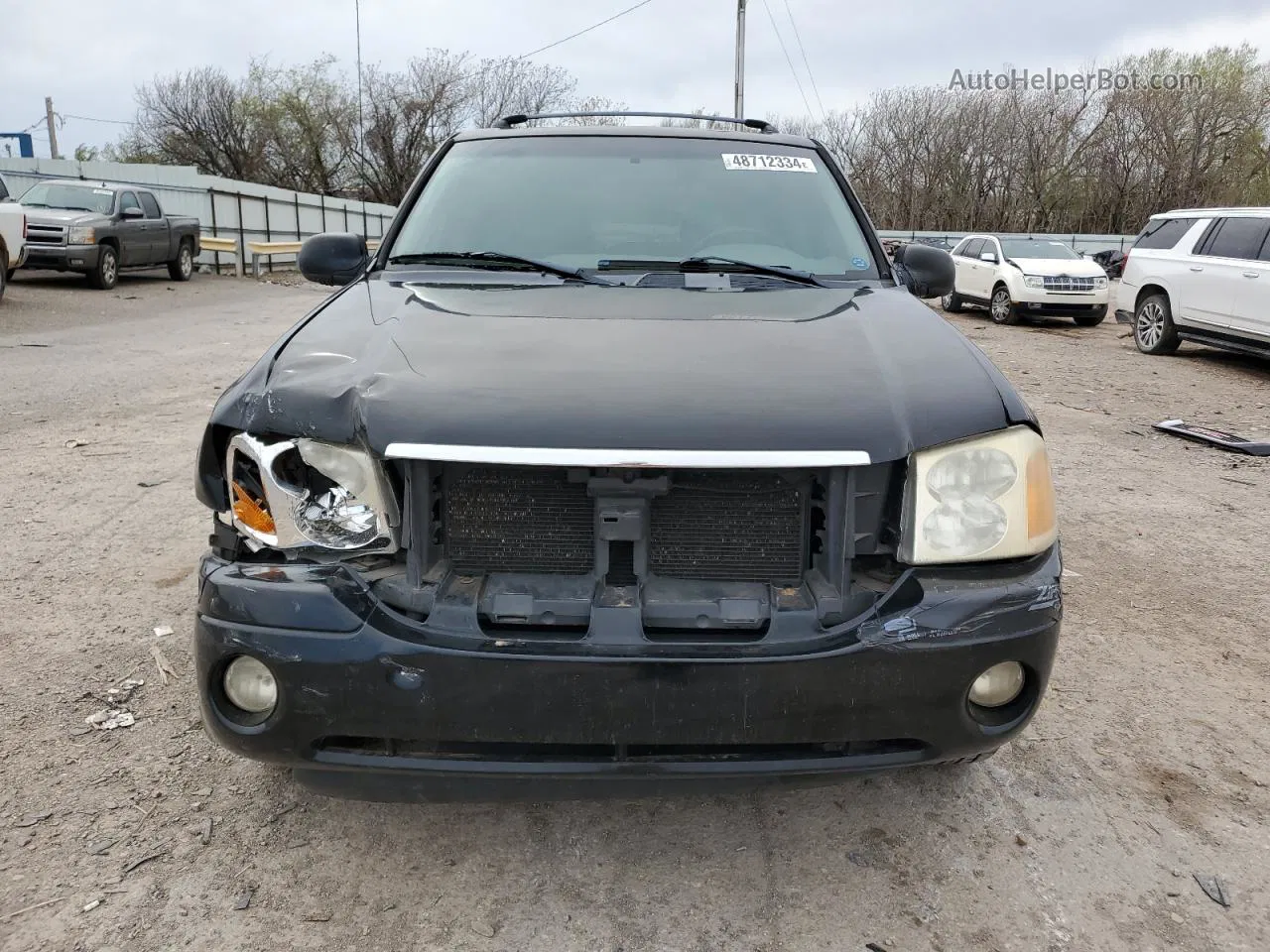 2004 Gmc Envoy  Black vin: 1GKDS13S842125647