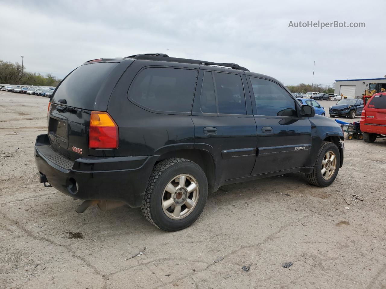 2004 Gmc Envoy  Black vin: 1GKDS13S842125647