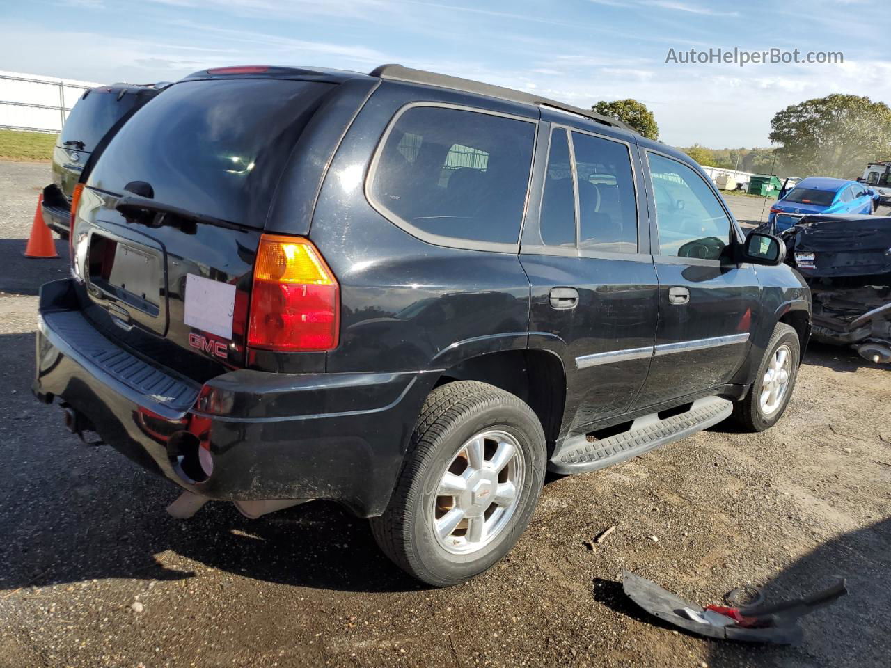 2007 Gmc Envoy  Black vin: 1GKDS13S872223856