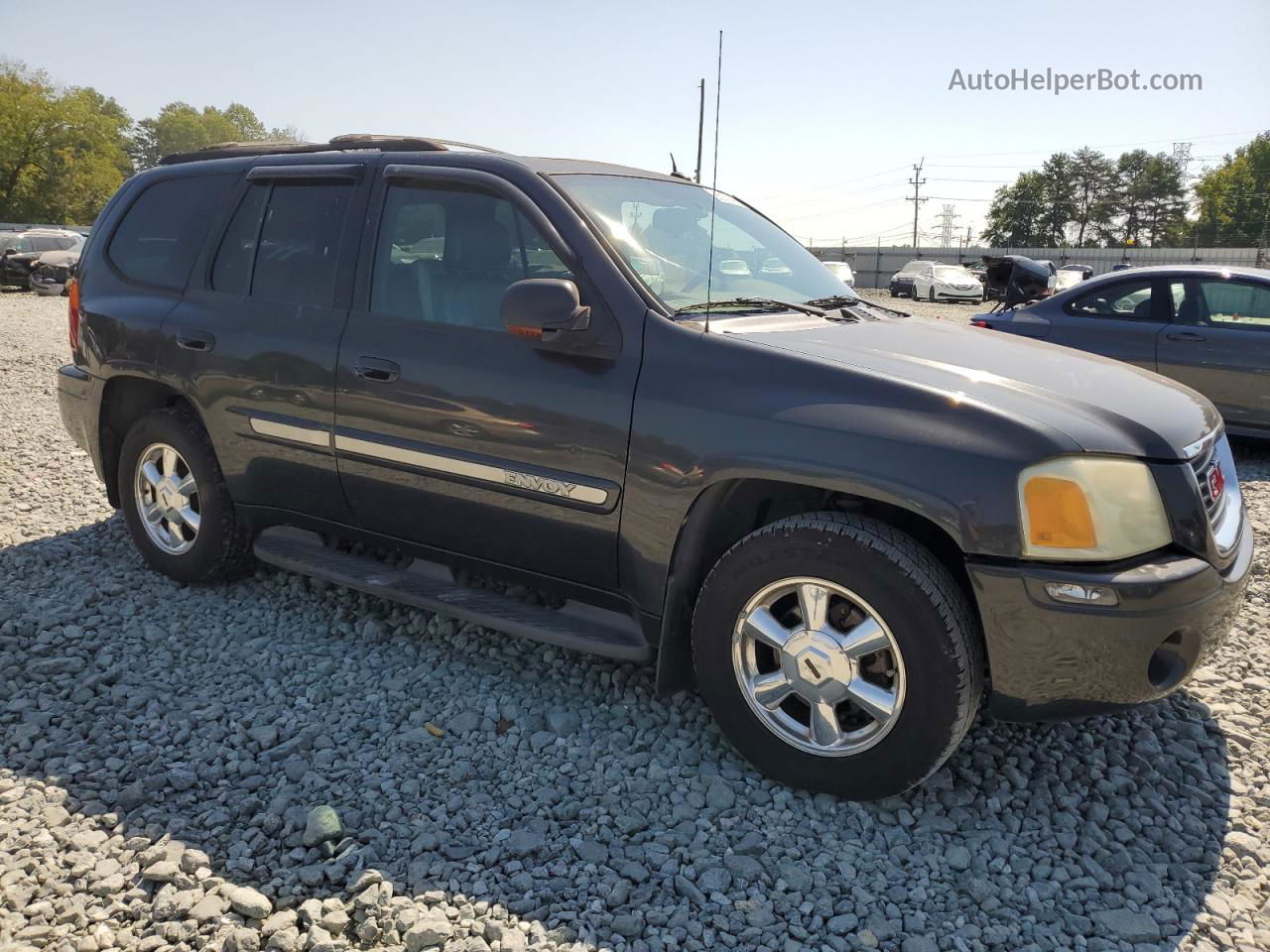 2004 Gmc Envoy  Black vin: 1GKDS13S942441011