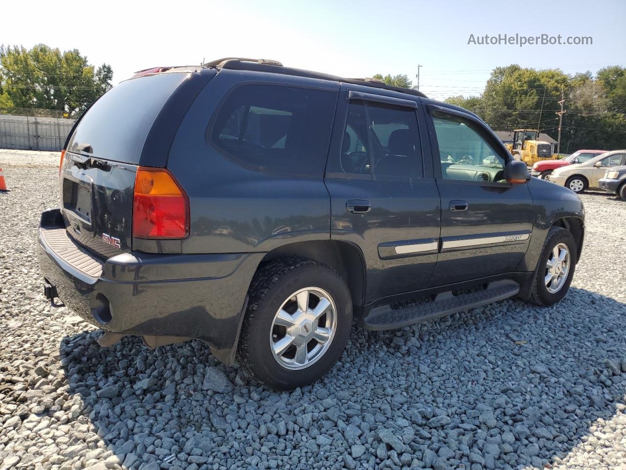 2004 Gmc Envoy  Black vin: 1GKDS13S942441011