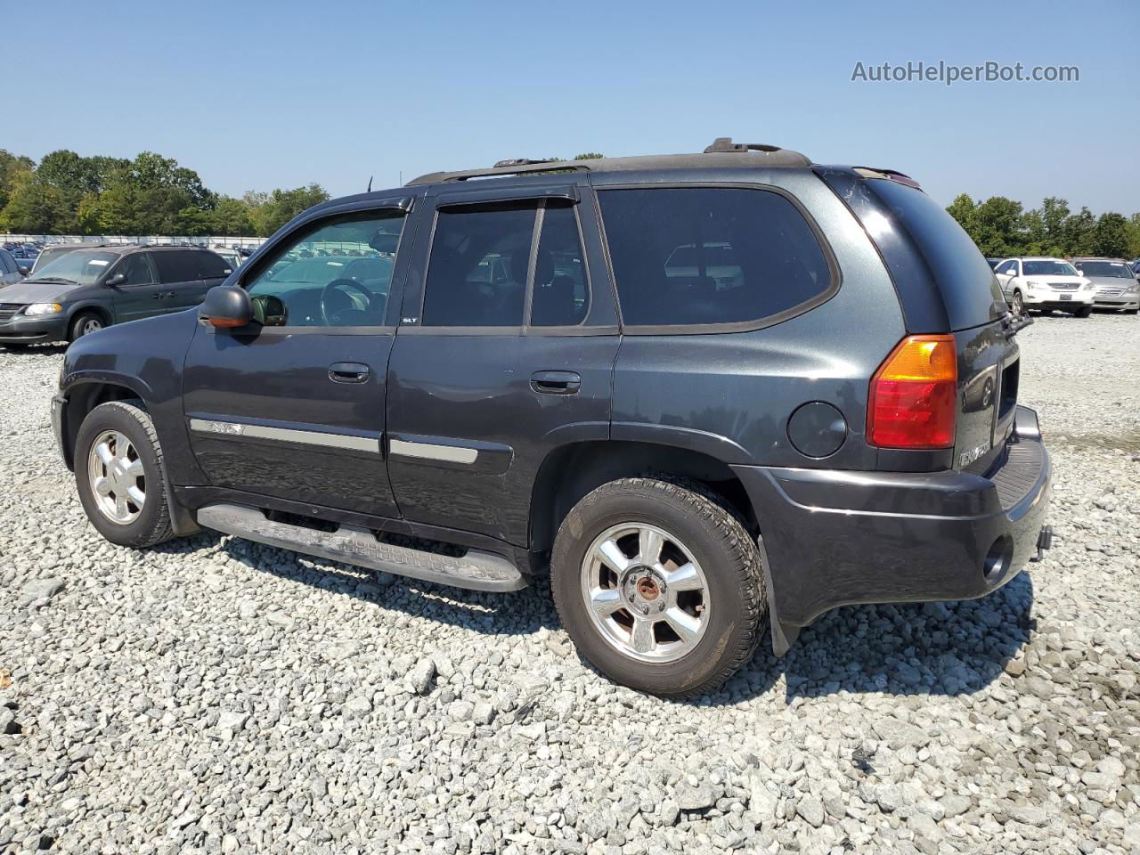 2004 Gmc Envoy  Black vin: 1GKDS13S942441011