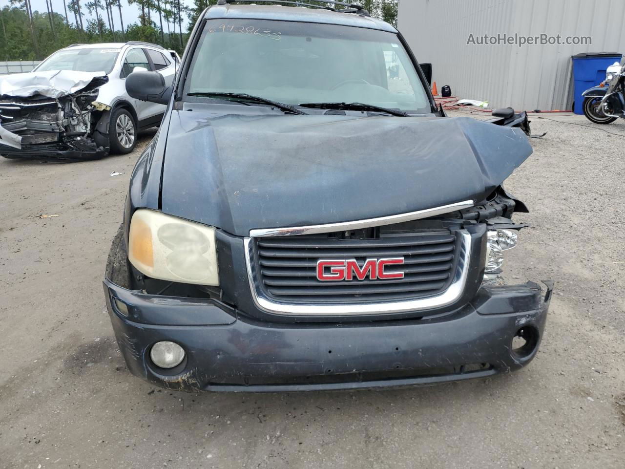 2003 Gmc Envoy  Black vin: 1GKDS13SX32351171