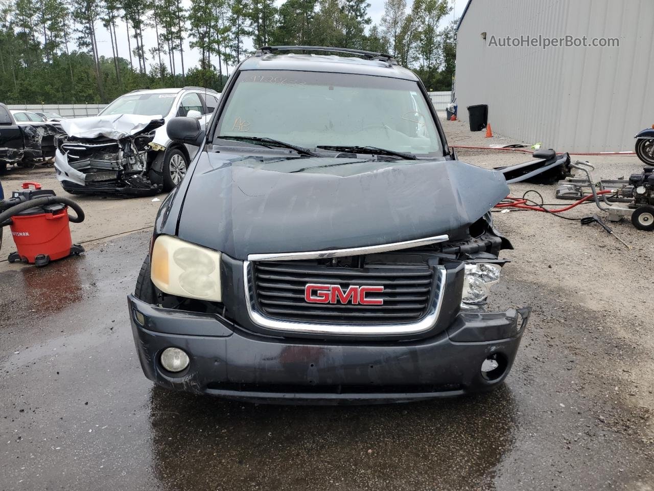 2003 Gmc Envoy  Black vin: 1GKDS13SX32351171