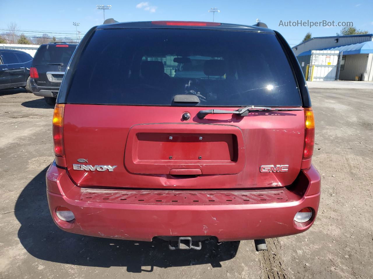 2004 Gmc Envoy  Maroon vin: 1GKDT13S042429469