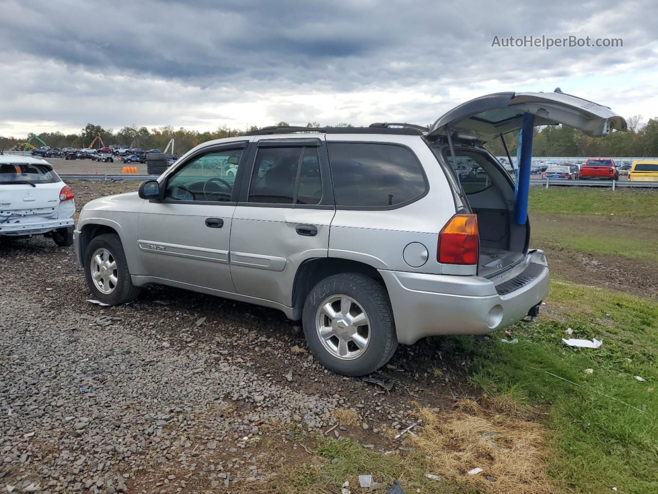 2005 Gmc Envoy  Silver vin: 1GKDT13S152104430