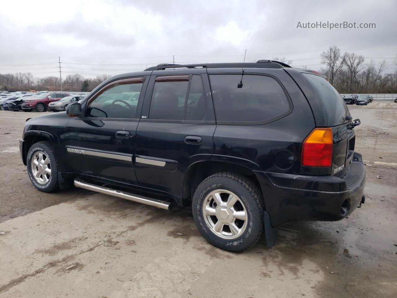 2003 Gmc Envoy  Black vin: 1GKDT13S232280044