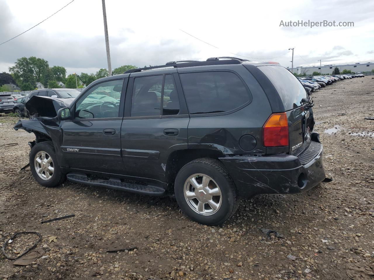 2004 Gmc Envoy  Black vin: 1GKDT13S242162058