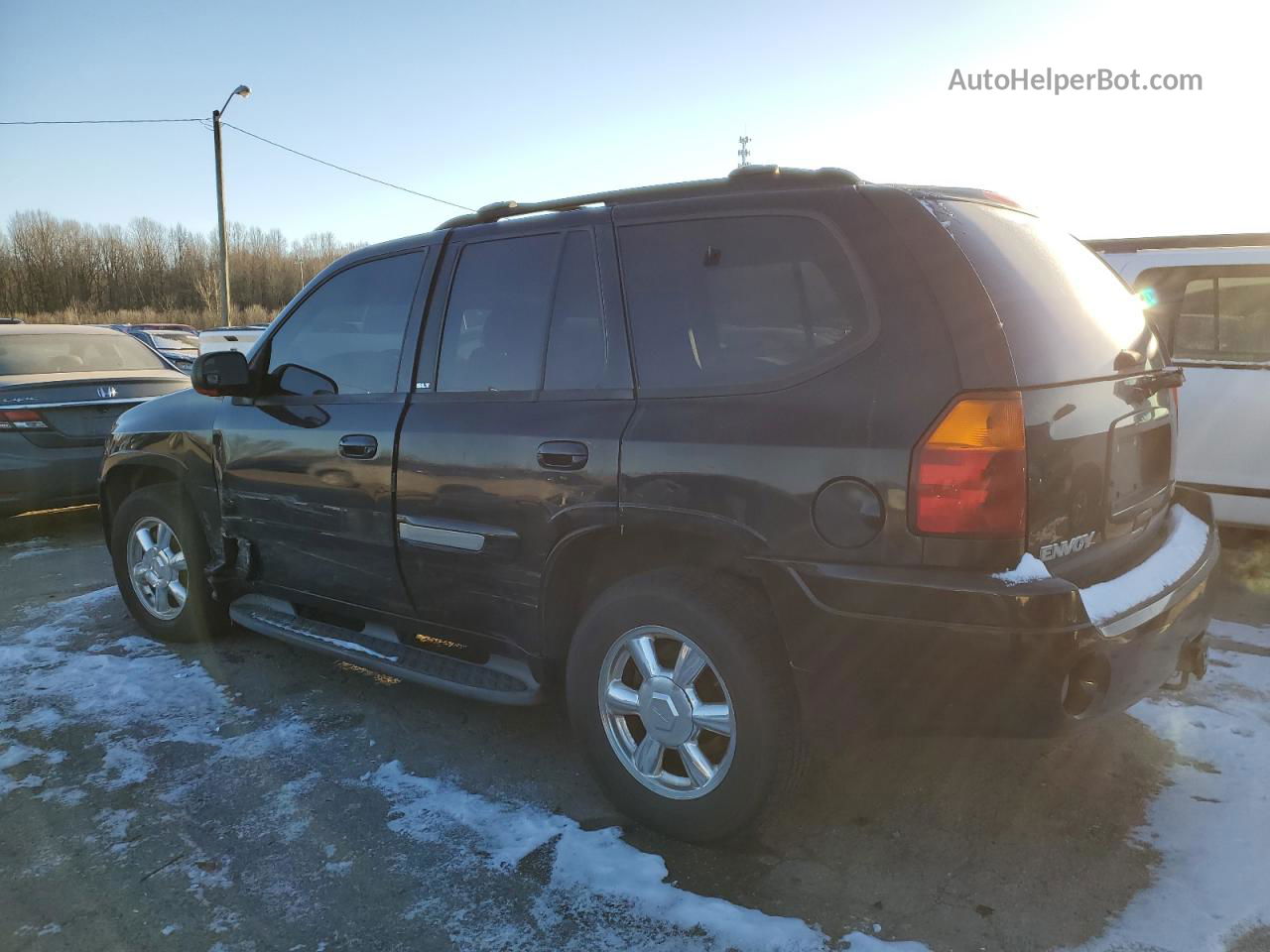 2003 Gmc Envoy  Black vin: 1GKDT13S332395736