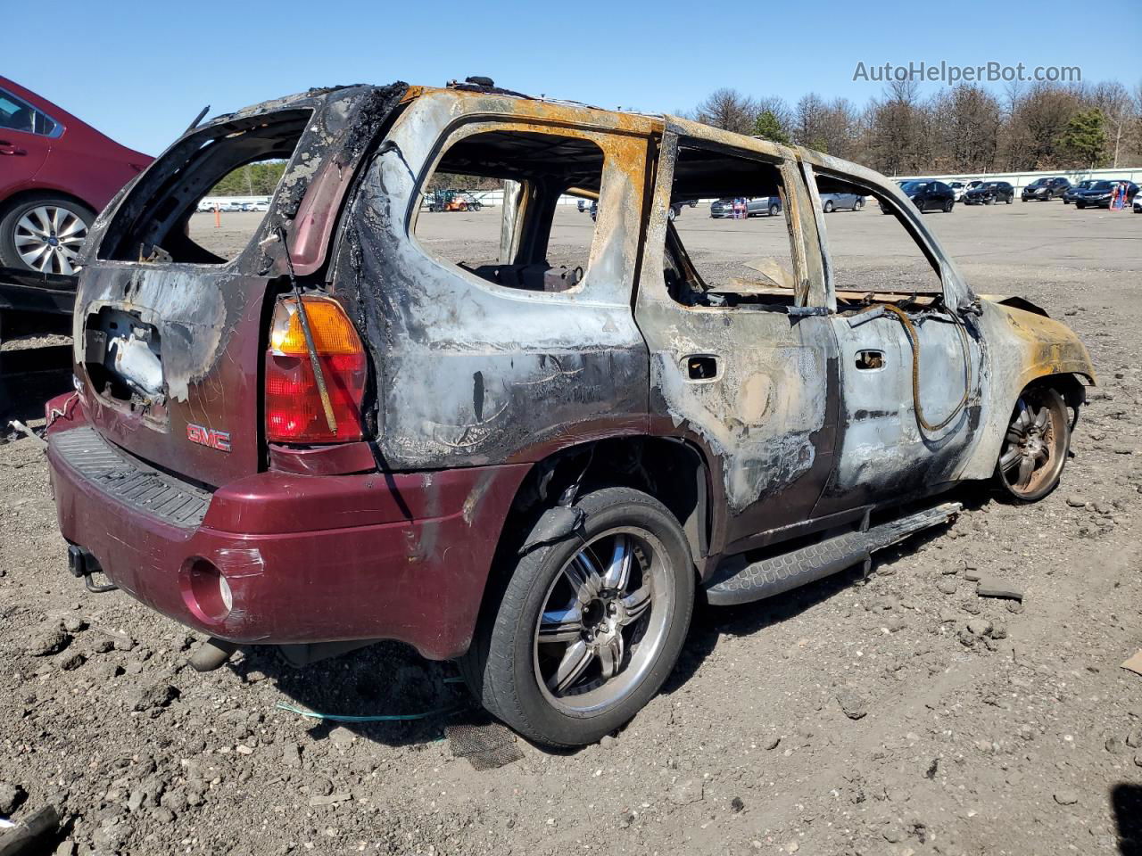 2005 Gmc Envoy  Red vin: 1GKDT13S452256413