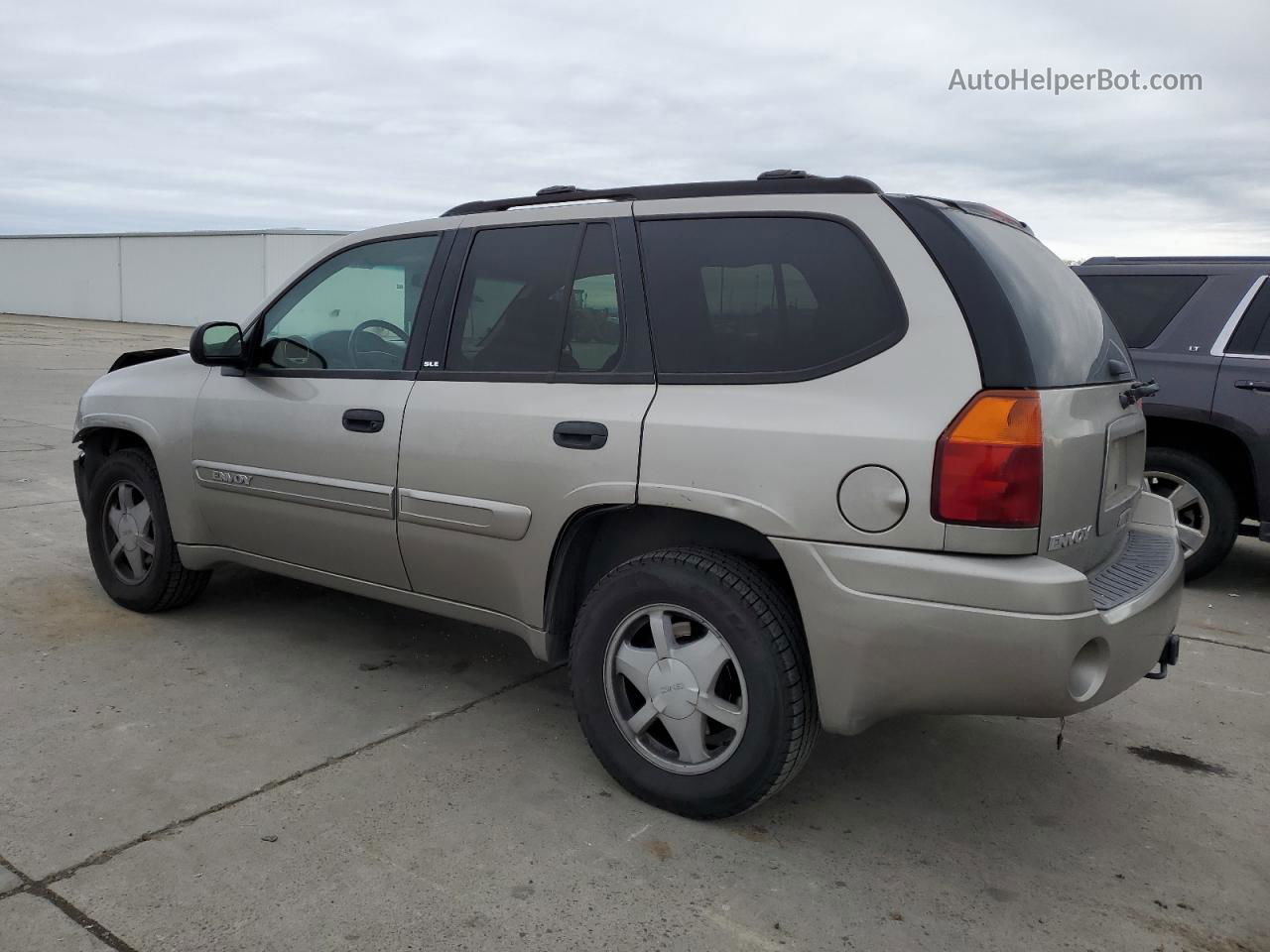 2003 Gmc Envoy  Beige vin: 1GKDT13S532406090