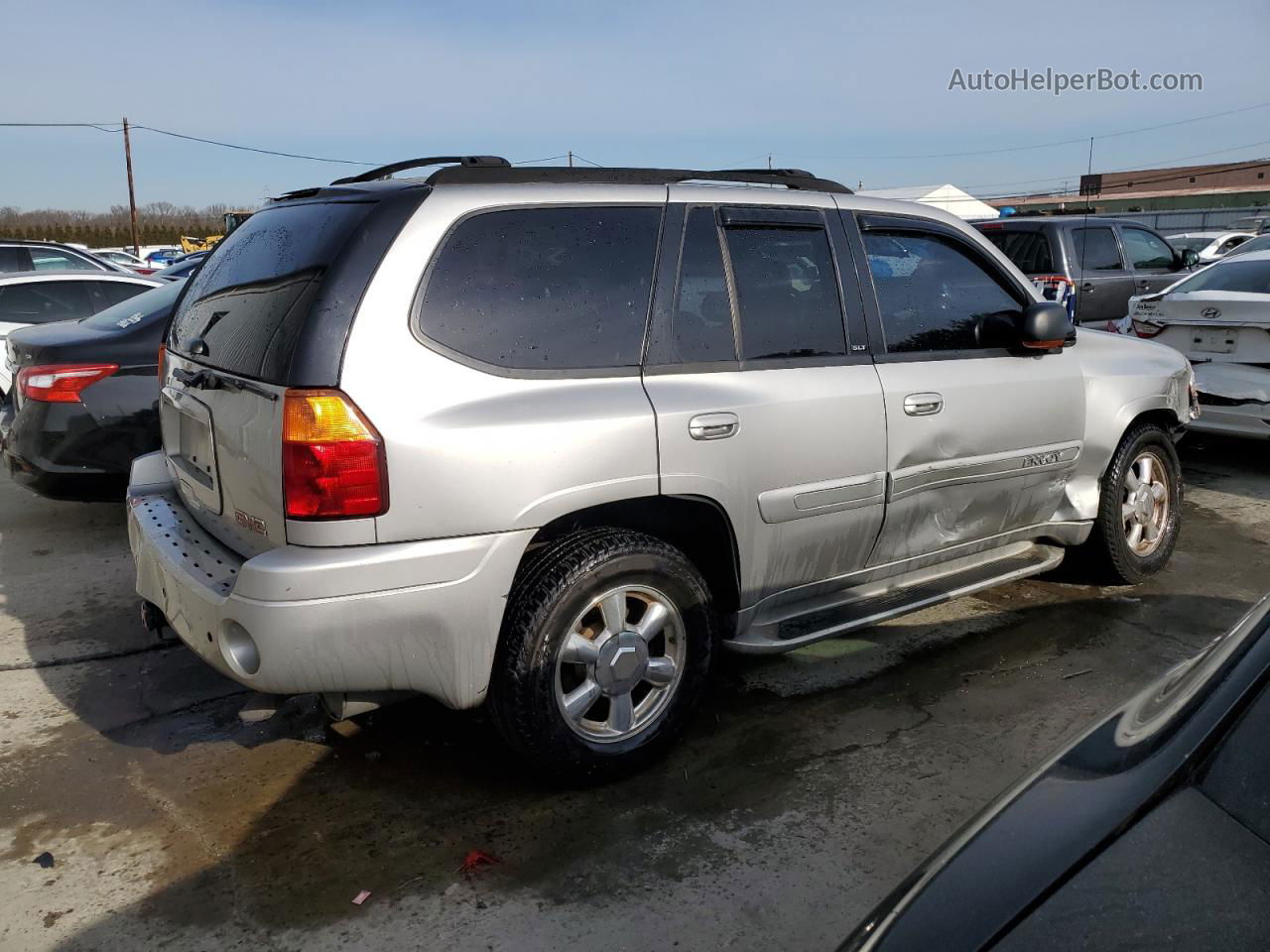 2004 Gmc Envoy  Серебряный vin: 1GKDT13S542141950